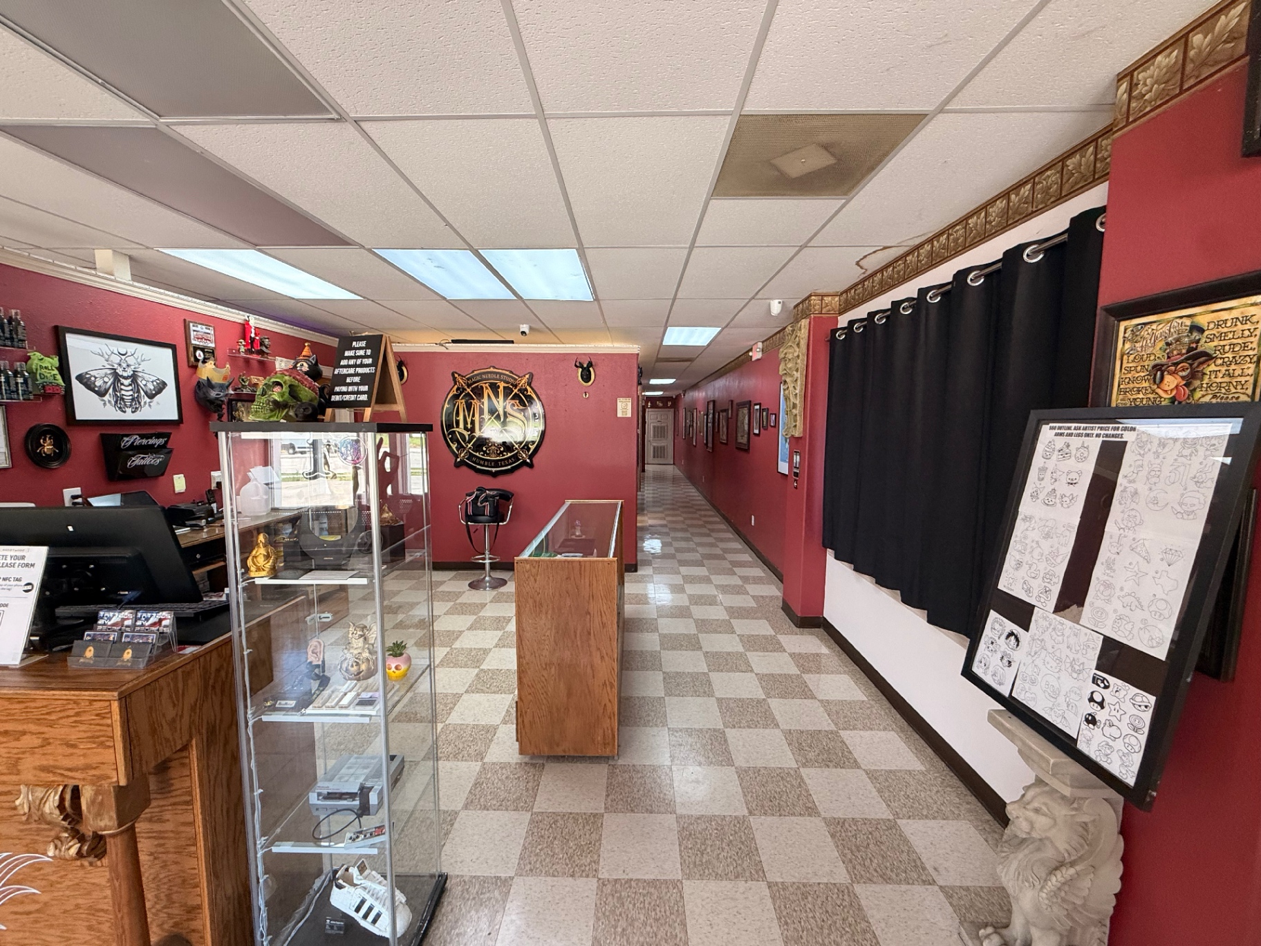 Front counter and jewelry display at Magic Needle Studio